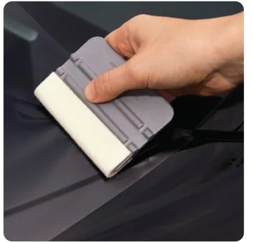 Smart Signz technician applying vinyl wrap